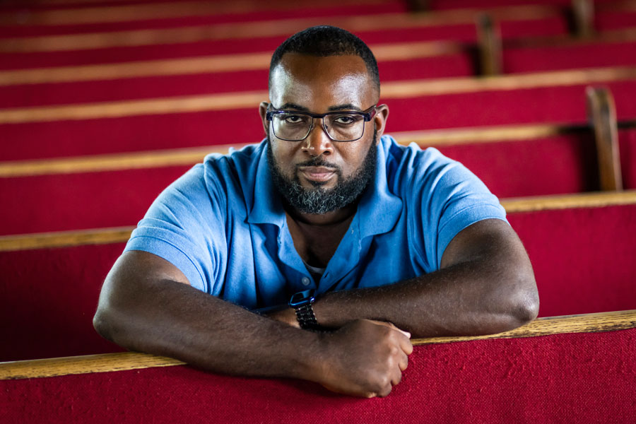 Special education teacher Brandon Forbish sits inside Greater St. John Bible Church at 1256 N. Waller Ave. on the West Side, Tuesday, July 25, 2023.