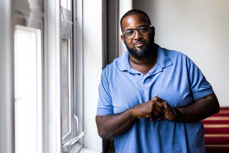 Special education teacher Brandon Forbish sits inside Greater St. John Bible Church at 1256 N. Waller Ave. on the West Side, Tuesday, July 25, 2023.