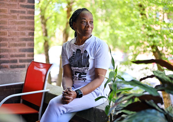 Portrait of Deborah Payne, a lifelong activist who is dedicated to improving Chicago’s South Side, sits on the front porch of her apartment in the Bronzeville neighborhood.