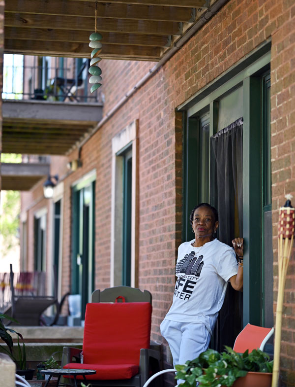 Portrait of Deborah Payne, a lifelong activist who is dedicated to improving Chicago’s South Side, sits on the front porch of her apartment in the Bronzeville neighborhood.